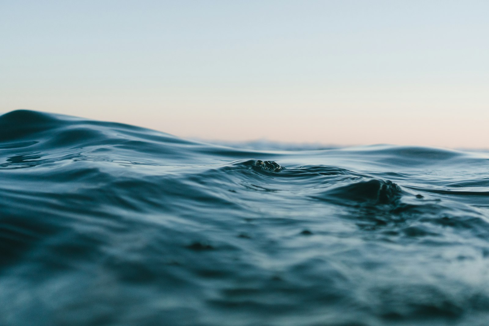 Calm swell on cold northern water at dusk